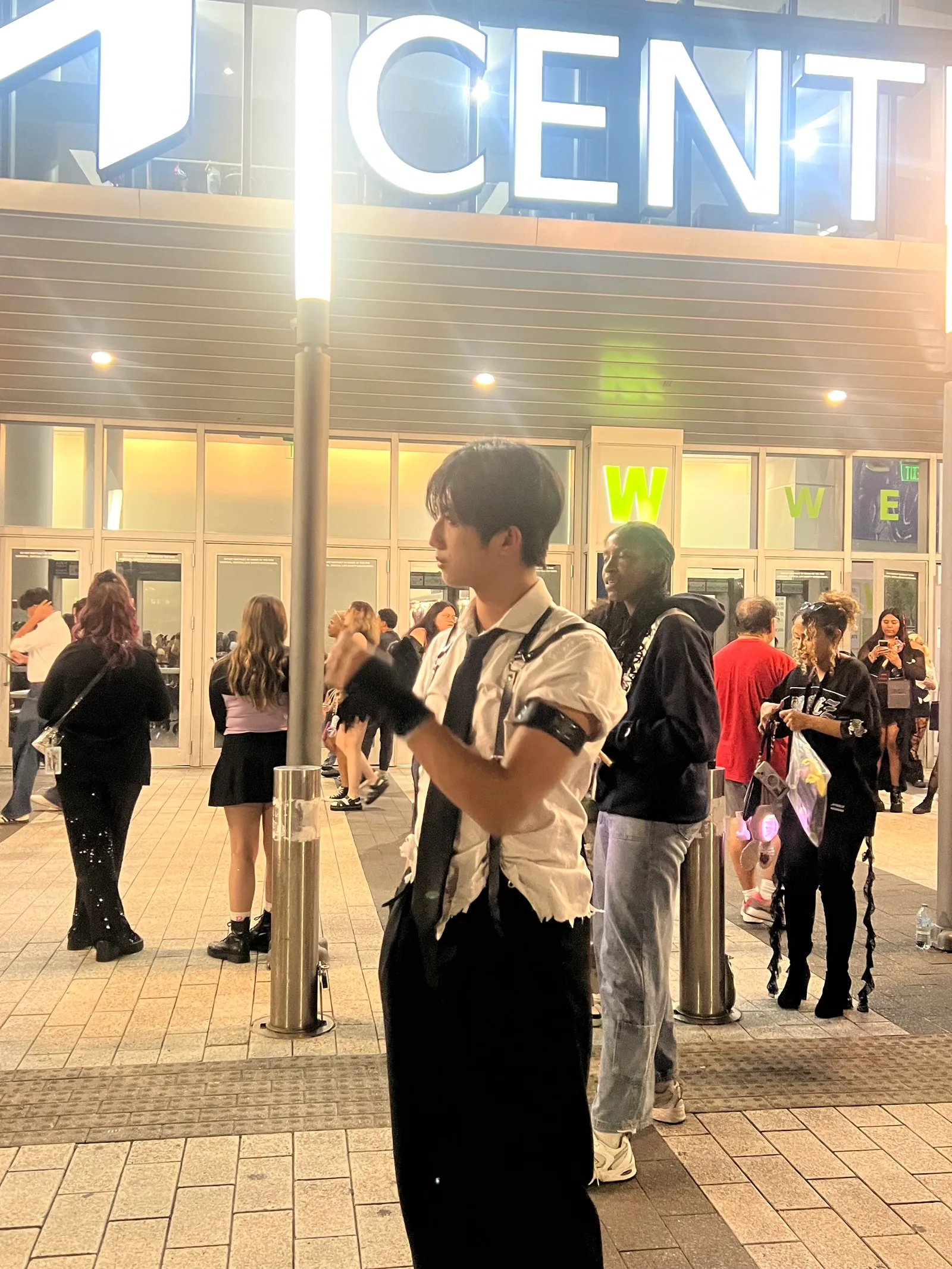 Chris dressed for an ATEEZ concert outside the venue